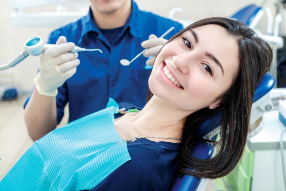 woman sitting in dental chair