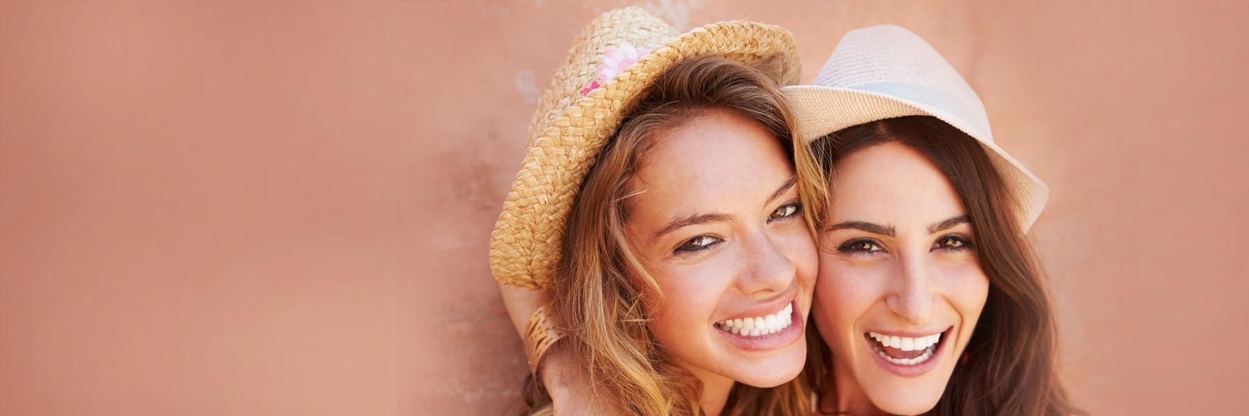 Two women laughing l Cosmetic Dentist Doylestown PA