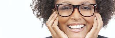 woman smiling after getting doylestown dental implants