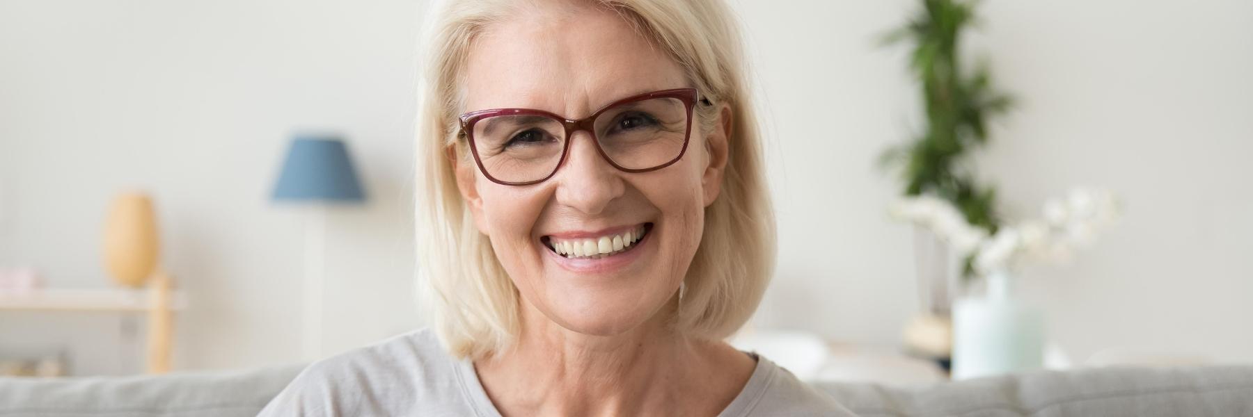 blonde woman smiling at the dentist near me in doylestown pa
